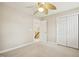 Cozy bedroom featuring a ceiling fan and ample closet space at 1515 Poets Glade Dr, Apex, NC 27523