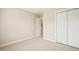Bright bedroom with a closet and a glimpse into an adjoining bathroom at 1515 Poets Glade Dr, Apex, NC 27523