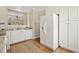 Kitchen featuring white cabinets and stainless steel appliances at 1515 Poets Glade Dr, Apex, NC 27523