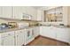 Kitchen featuring white cabinets and stainless steel appliances at 1515 Poets Glade Dr, Apex, NC 27523