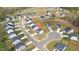 Beautiful aerial view of a home in a well-planned community with manicured lawns and neighborhood streets at 1725 Langlais Dr, Graham, NC 27253