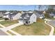 Charming two-story home with a two car garage and landscaped yard in a suburban community at 1725 Langlais Dr, Graham, NC 27253