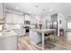 Beautiful kitchen with granite countertops, stainless steel appliances, and a kitchen island with barstool seating at 1725 Langlais Dr, Graham, NC 27253