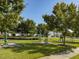 Inviting community park with exercise equipment and ample green space for outdoor activities and relaxation at 173 Hawk Point Rd, Chapel Hill, NC 27516