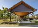 Community pavilion with picnic tables, perfect for outdoor gatherings at 173 Hawk Point Rd, Chapel Hill, NC 27516