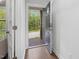 Bright entryway featuring hard wood floors and a view of the front porch at 173 Hawk Point Rd, Chapel Hill, NC 27516