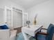 Bright office space with French doors, white walls, a desk and chairs, perfect for a home office at 173 Hawk Point Rd, Chapel Hill, NC 27516