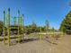 Dynamic playground featuring climbing structures and swings, designed for active fun at 173 Hawk Point Rd, Chapel Hill, NC 27516
