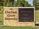 Chatham Grove Elementary's welcoming brick sign, complete with an electronic message board at 173 Hawk Point Rd, Chapel Hill, NC 27516