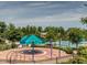 Community splash pad with colorful features for water play at 173 Hawk Point Rd, Chapel Hill, NC 27516
