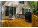 Outdoor deck ideal for entertaining with comfortable seating and a barbecue grill at 18 Green Ridge Ln, Pittsboro, NC 27312