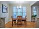 Dining area offering natural light and a cozy atmosphere for memorable meals at 18 Green Ridge Ln, Pittsboro, NC 27312