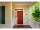 Charming front door featuring a bright red finish and classic design elements at 18 Green Ridge Ln, Pittsboro, NC 27312
