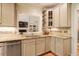 Kitchen with granite countertops, stylish backsplash, and stainless steel appliances at 18 Green Ridge Ln, Pittsboro, NC 27312