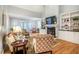 Bright living room with a fireplace flanked by built-in bookshelves at 18 Green Ridge Ln, Pittsboro, NC 27312