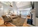 Spacious living room with vaulted ceiling, fireplace, and a view to the upper level at 18 Green Ridge Ln, Pittsboro, NC 27312