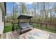 Back deck with outdoor furniture and trees in the background at 20 Izuba Day Dr, Timberlake, NC 27583