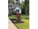 Well-maintained yard with beautiful landscaping and curb appeal at 20 Izuba Day Dr, Timberlake, NC 27583
