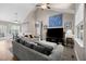 Living room featuring hardwood and carpet floors with vaulted ceilings and comfortable seating area at 20 Izuba Day Dr, Timberlake, NC 27583