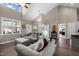 Open living room with vaulted ceilings and comfortable seating area with neutral color palette at 20 Izuba Day Dr, Timberlake, NC 27583