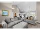 Open concept living and dining area with updated kitchen with stainless steel appliances and island at 20 Izuba Day Dr, Timberlake, NC 27583