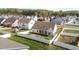 Expansive backyard view featuring a fence, lush greenery, and a covered patio, great for privacy and outdoor relaxation at 205 Mcclellan Trl, Mebane, NC 27302