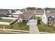 Charming single-Gathering home with a two-car garage, landscaped yard, and classic architectural details at 205 Mcclellan Trl, Mebane, NC 27302