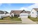 Charming single-Gathering home with a two-car garage, well-maintained lawn, and inviting curb appeal at 205 Mcclellan Trl, Mebane, NC 27302