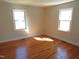 Bedroom with hardwood flooring, and natural light at 2117 Wrenn St, Burlington, NC 27215