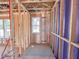 Framed interior of a home showcases the layout and window placement during the construction phase at 217 Pond Vw Ct # 7, Fuquay Varina, NC 27526