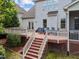 Large deck features stairs to the yard and plenty of space for seating and dining at 224 Clear River Pl, Cary, NC 27519
