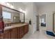 Bright bathroom featuring double sinks, granite countertop, and separate shower at 224 Clear River Pl, Cary, NC 27519