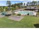 Community pool and playground are the perfect place for Gathering fun at 224 Clear River Pl, Cary, NC 27519
