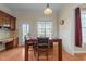 Bright dining area with natural light and adjacent kitchen features at 224 Clear River Pl, Cary, NC 27519