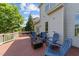 An outdoor deck with seating area provides a relaxing space to enjoy the outdoors and unwind from the privacy of your home at 224 Clear River Pl, Cary, NC 27519