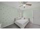 Cozy bedroom with light green walls, neutral carpet, and charming star-shaped decorations at 230 Bradley Dr, Benson, NC 27504