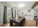 Dining room featuring modern lighting and a large window that provides plenty of natural light at 230 Bradley Dr, Benson, NC 27504