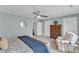 Stylish bedroom featuring a ceiling fan, neutral walls, and carpeted floors at 2321 Swansea Ln, Apex, NC 27502
