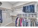 Well-organized closet with ample shelving and hanging space for efficient storage solutions at 2321 Swansea Ln, Apex, NC 27502