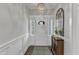 Bright entryway with elegant chandelier and lovely decor at 2321 Swansea Ln, Apex, NC 27502