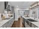 Well-designed kitchen includes stainless steel appliances and quartz countertops at 2321 Swansea Ln, Apex, NC 27502