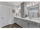 Stylish main bathroom featuring a double vanity, modern fixtures, and sleek countertops at 2321 Swansea Ln, Apex, NC 27502