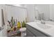 Bright, modern bathroom with vanity, stylish cactus-themed shower curtain, and sleek fixtures at 254 W Odell Ln, Zebulon, NC 27597