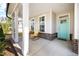 Charming covered porch featuring rocking chairs perfect for relaxing and enjoying the outdoors at 254 W Odell Ln, Zebulon, NC 27597