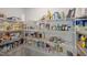 Well-stocked pantry with adjustable shelving provides ample storage space for food and household items at 254 W Odell Ln, Zebulon, NC 27597