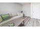Comfortable basement seating area with a stylish sofa and a view of natural light at 2613 Beckwith Rd, Apex, NC 27523