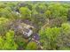 Aerial view of a residential neighborhood with mature trees and well-maintained homes at 2613 Hiking Trl, Raleigh, NC 27615