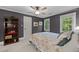 Cozy bedroom featuring carpeted floors, ample natural light, and neutral colors at 2613 Hiking Trl, Raleigh, NC 27615