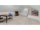 Versatile bonus room featuring a TV, built-in shelves, and plenty of open space at 2613 Hiking Trl, Raleigh, NC 27615