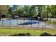 Fenced, well-maintained, green and blue tennis courts provide community residents with an enjoyable place to play at 2613 Hiking Trl, Raleigh, NC 27615